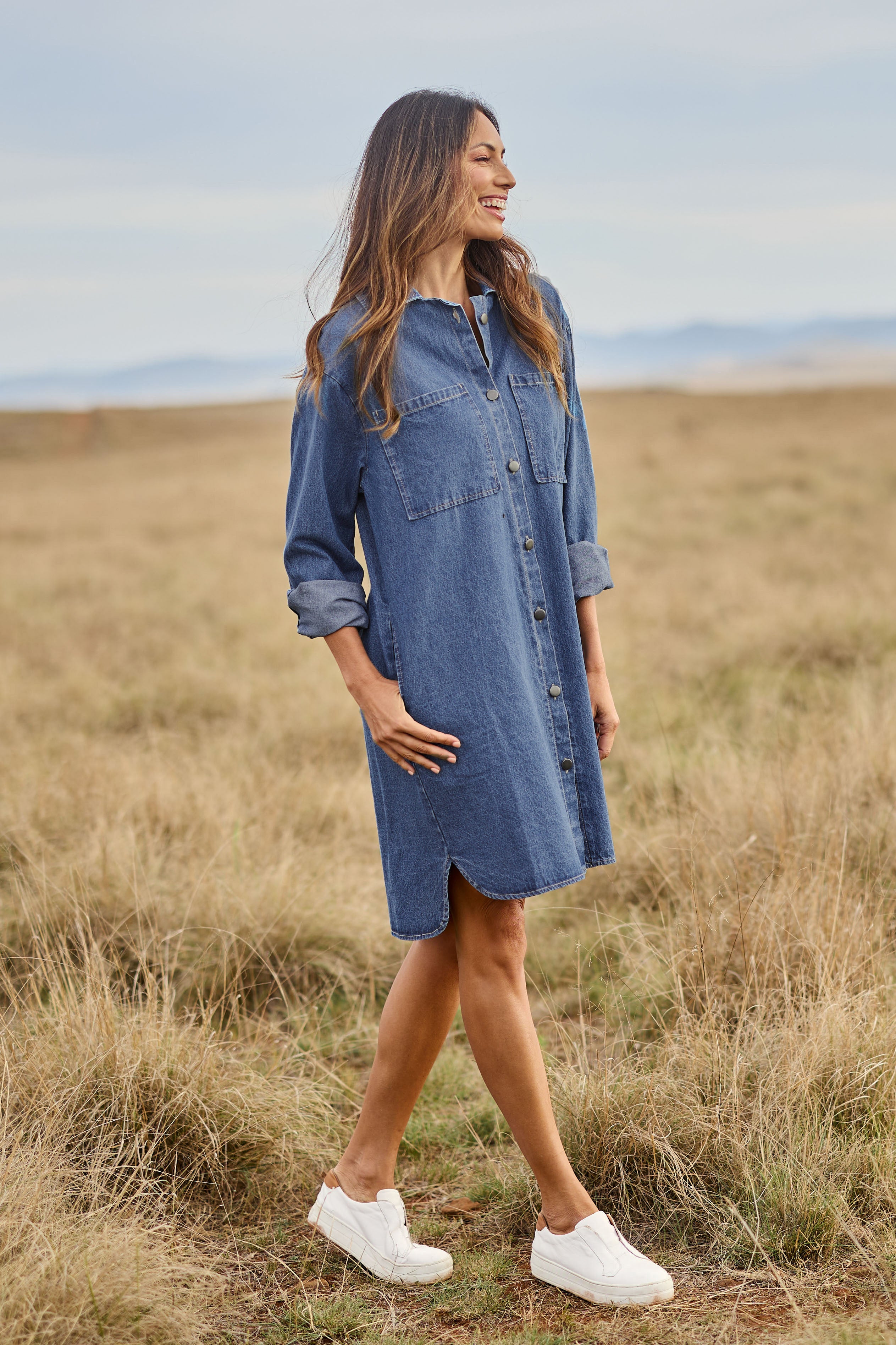 Model Amanda wearing size 10 of The Denim Shacket Dress With Pockets in colour Denimblue (Blue), from the front, showing the whole outfit