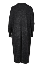 Product shot of The Relaxed L/S Tee Dress With Pockets in colour Blackmarle (Black), from the back