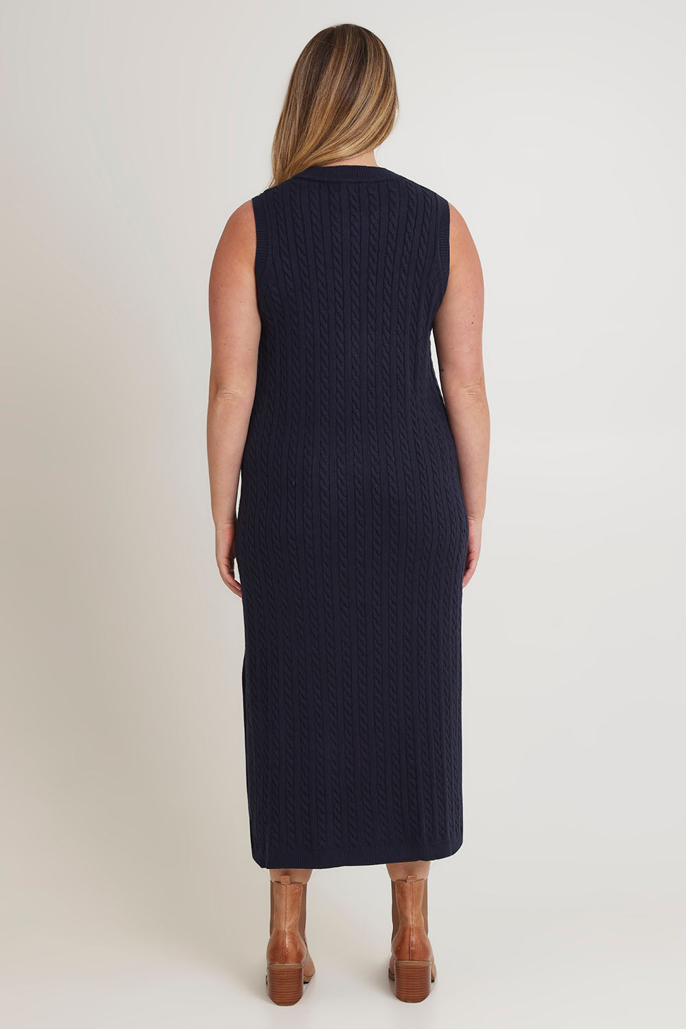 Model Chanel wearing size XL of The Mock Turtle Cable Maxi Dress in colour Darknavy (Blue), from the back