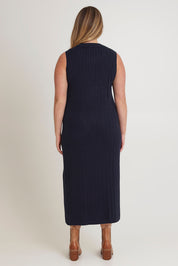 Model Chanel wearing size XL of The Mock Turtle Cable Maxi Dress in colour Darknavy (Blue), from the back