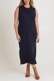 Model Chanel wearing size XL of The Mock Turtle Cable Maxi Dress in colour Darknavy (Blue), from the front, cropped image