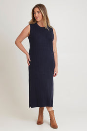 Model Chanel wearing size XL of The Mock Turtle Cable Maxi Dress in colour Darknavy (Blue), from the front, showing the whole outfit