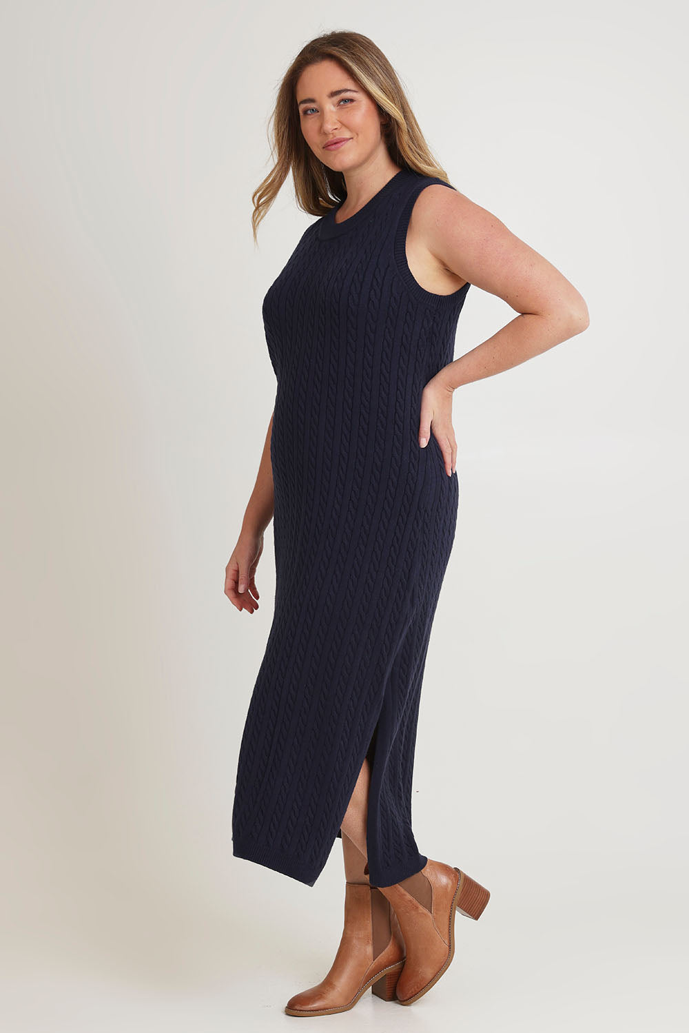 Model Chanel wearing size XL of The Mock Turtle Cable Maxi Dress in colour Darknavy (Blue), from the front, showing the whole outfit