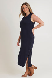 Model Chanel wearing size XL of The Mock Turtle Cable Maxi Dress in colour Darknavy (Blue), from the front, showing the whole outfit