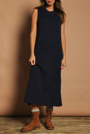 Model Madeline wearing size S of The Mock Turtle Cable Maxi Dress in colour Darknavy (Blue), from the front, cropped image