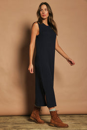 Model Madeline wearing size S of The Mock Turtle Cable Maxi Dress in colour Darknavy (Blue), from the front, showing the whole outfit
