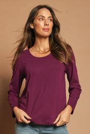 Model Madeline wearing size 10 of The Classic Long Sleeve Tee in colour Plum (Purple), from the front, showing the whole outfit