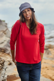 Model Amanda wearing size 10 of The Classic Long Sleeve Tee in colour Red (Red), from the front, showing the whole outfit