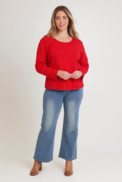 Model Chanel wearing size 16 of The Classic Long Sleeve Tee in colour Red (Red), from the front, showing the whole outfit