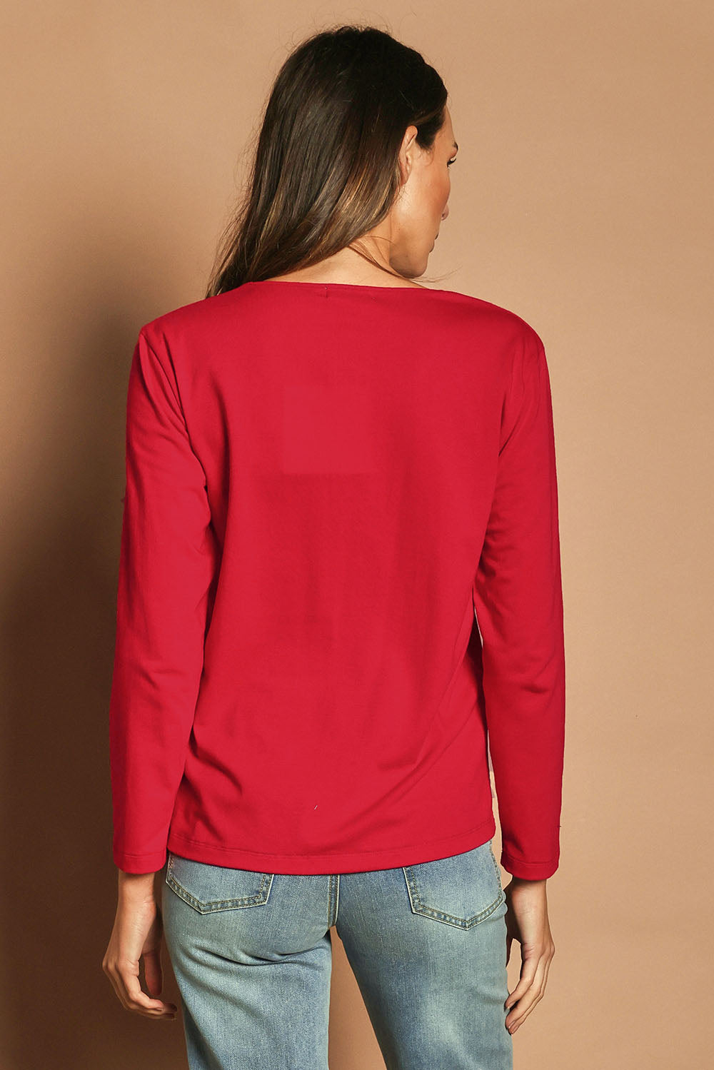 Model Madeline wearing size 10 of The Classic Long Sleeve Tee in colour Red (Red), from the back