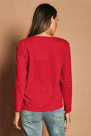 Model Madeline wearing size 10 of The Classic Long Sleeve Tee in colour Red (Red), from the back