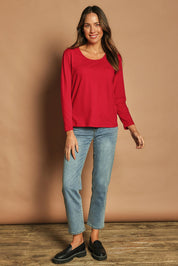 Model Madeline wearing size 10 of The Classic Long Sleeve Tee in colour Red (Red), from the front, showing the whole outfit