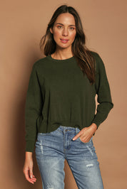 Model Madeline wearing size S of The Essential Cropped Modal Blend Jumper in colour Pine (Green), from the front, cropped image