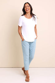 Model Amandam wearing size 10 of the The Pull On Cotton Pant With Drawstring – Aloe in colour Aloe, from the front