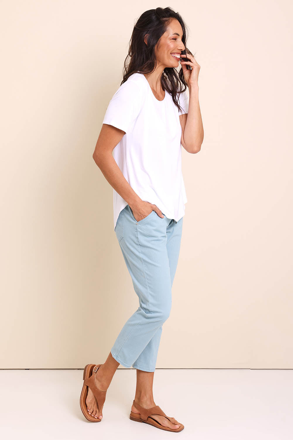 Model Amandam wearing size 10 of the The Pull On Cotton Pant With Drawstring – Aloe in colour Aloe, from the front