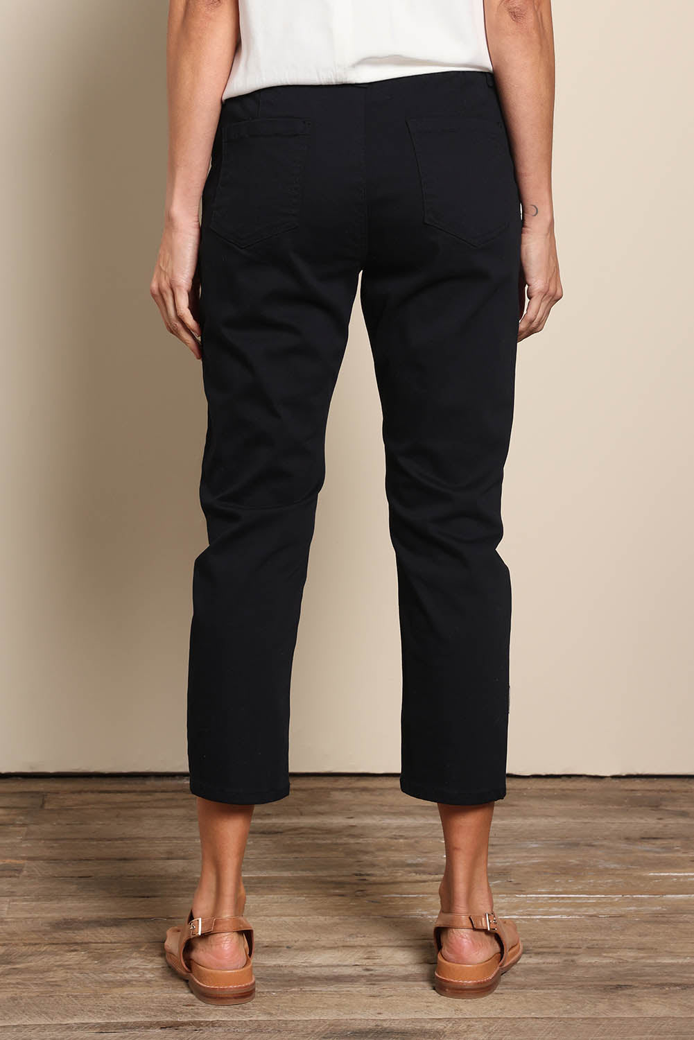 Model Amandam wearing size 10 of the The Pull On Cotton Pant With Drawstring – Black in colour Black, from the front