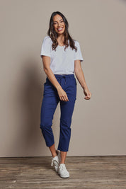 Model Amanda wearing size 10 of The Pull On Cotton Pant With Drawstring in colour Indigo (Blue), from the front, showing the whole outfit