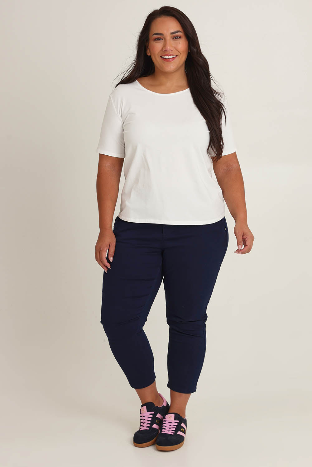 Model Ashleigh wearing size 16 of The Pull On Cotton Pant With Drawstring in colour Navy (Blue), from the front, showing the whole outfit
