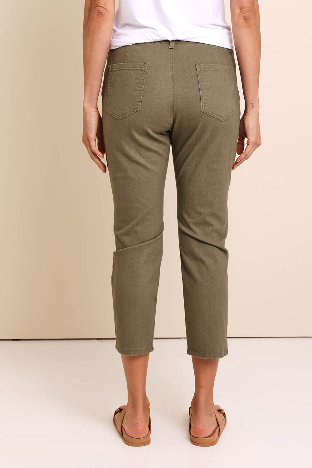 Model Amandam wearing size 10 of the The Pull On Cotton Pant With Drawstring – Olive in colour Olive, from the front