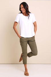 Model Amandam wearing size 10 of the The Pull On Cotton Pant With Drawstring – Olive in colour Olive, from the front