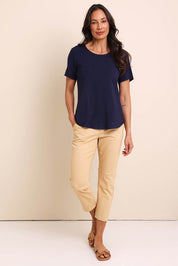 Model Amandam wearing size 10 of the The Pull On Cotton Pant With Drawstring – Sand in colour Sand, from the front
