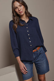 Model Madeline wearing size 10 of The Must Have Linen Look Shirt in colour Navy (Blue), from the front, cropped image