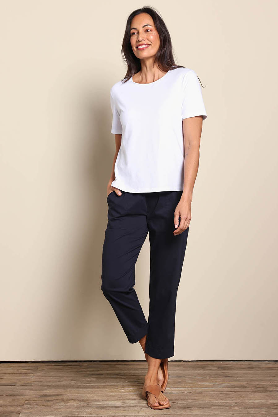 Model Amandam wearing size 10 of the The Elastic Waist Pull On Patch Pocket Pant – Navy in colour Navy, from the front