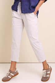 Model Amandam wearing size 10 of the The Elastic Waist Pull On Patch Pocket Pant – Pummice in colour Pummice, in a cropped view
