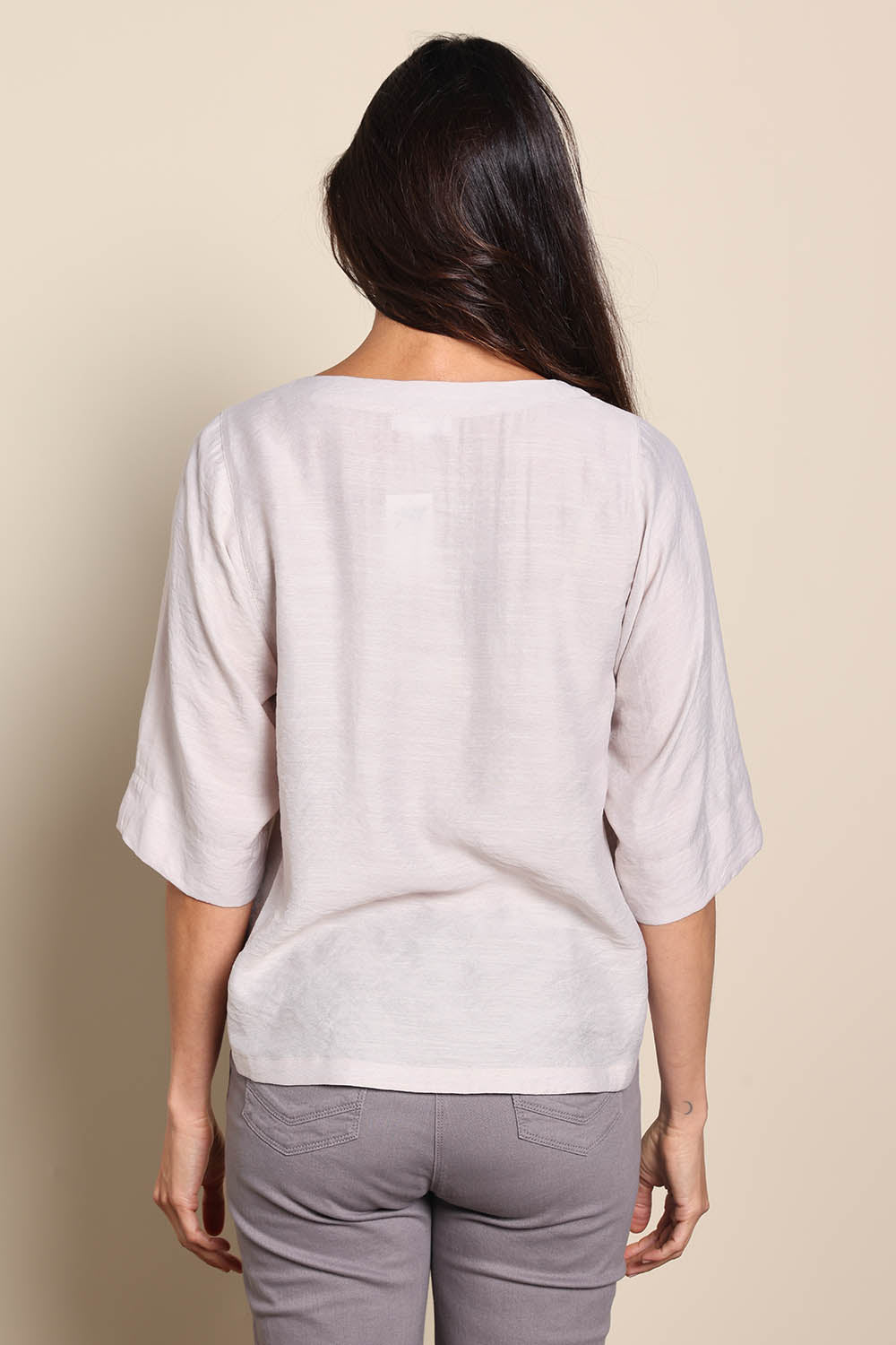 Model Amandam wearing size 10 of the The Popover Cotton Blend Boat Neck Top – Natural in colour Natural, from the back