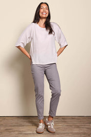 Model Amandam wearing size 10 of the The Popover Cotton Blend Boat Neck Top – Natural in colour Natural, from the front