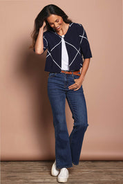 Model Amanda wearing size 10 of The Easy Wear Printed Shrug in colour Navywhite (Blue), from the front, showing the whole outfit