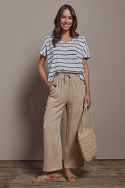 Model Madeline wearing size 10 of The Must Have Linen Look Pull on Pant in colour Biscotti, from the front, showing the whole outfit