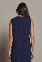 Model Amanda wearing size 10 of The Mix Me Match Me Bamboo Tank in colour Darknavy (Blue), from the back