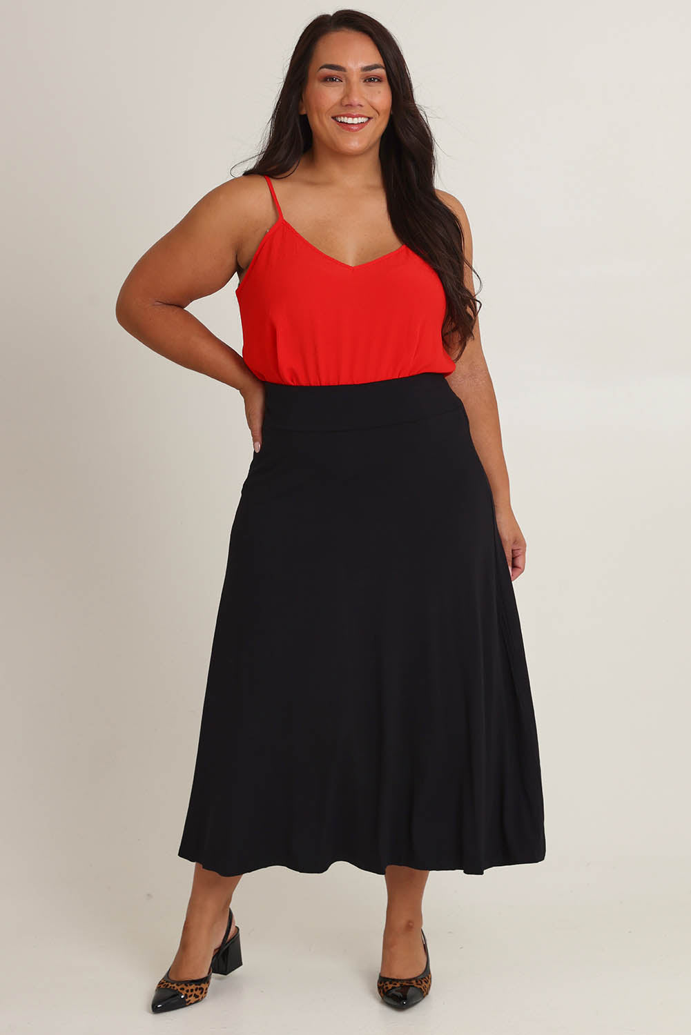 Model Ashleigh wearing size 14 of The Mix Me Match Me Bamboo Full Skirt in colour Black (Black), from the front, showing the whole outfit