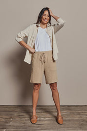 Model Amanda wearing size 10 of The Must Have Linen Look Pull On Shorts in colour Naturals, from the front, showing the whole outfit