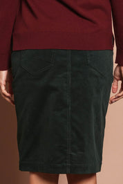 Model Amanda wearing size 10 of The Keepers Cord Pull On Skirt in colour Deepforest (Green), from the back