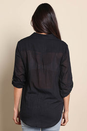 Model Amandam wearing size 10 of the The Go To Comfort Shirt - Black in colour Black, from the back