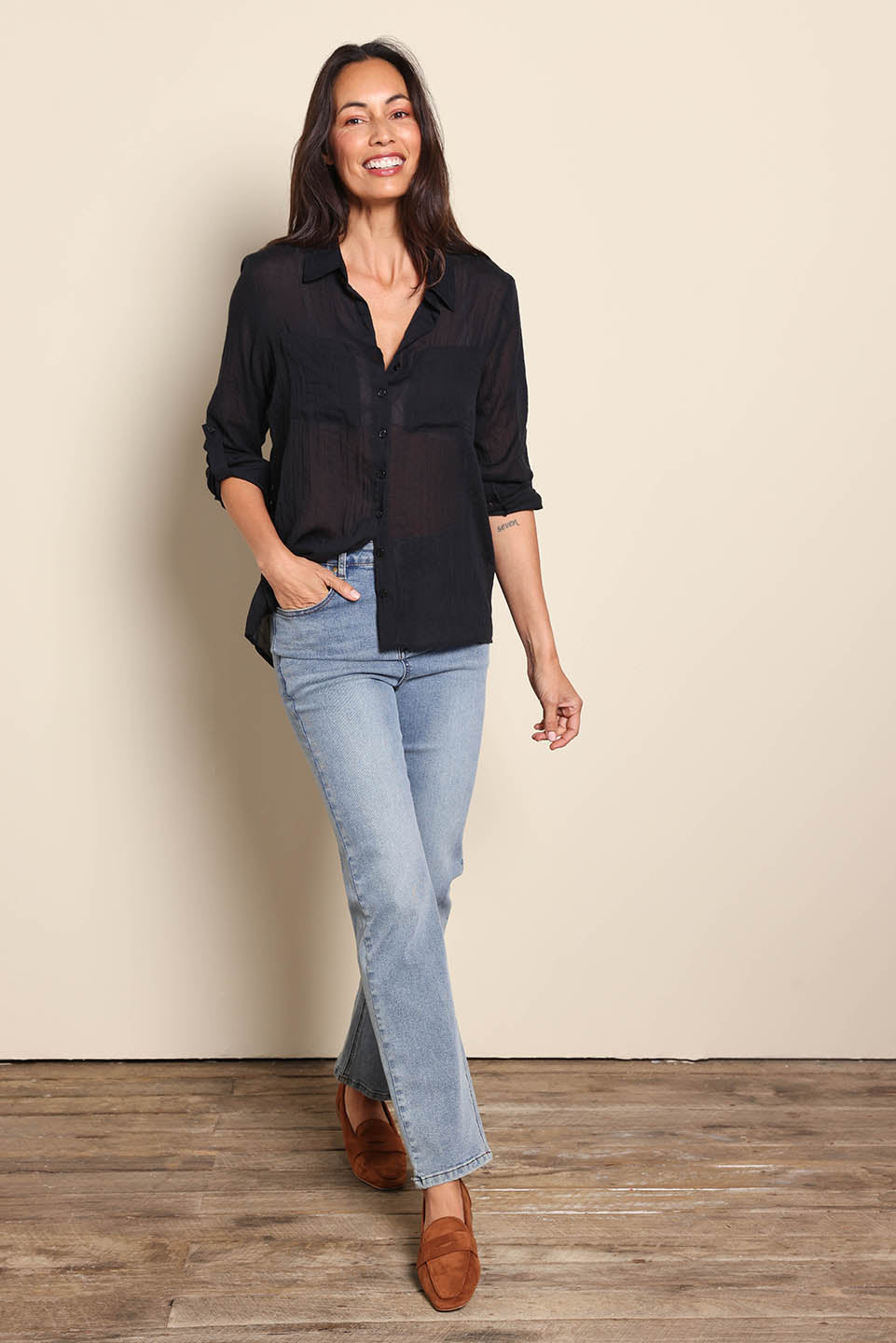 Model Amandam wearing size 10 of the The Go To Comfort Shirt - Black in colour Black, from the front