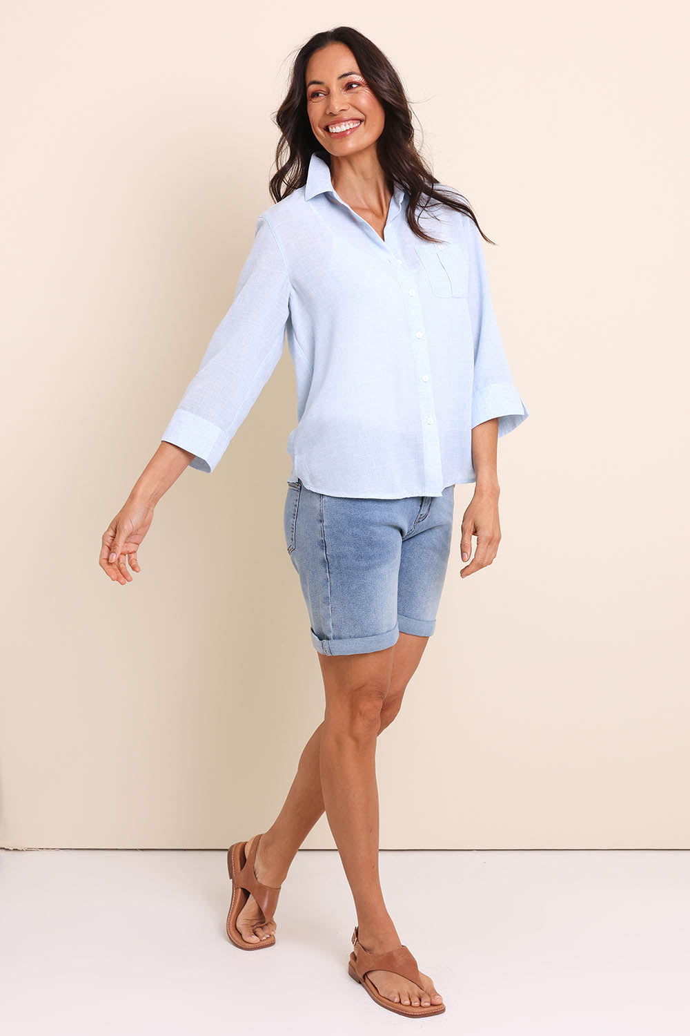 Model Amandam wearing size 10 of the The Easy Wear Shirt  - Chambray in colour Chambray, from the front