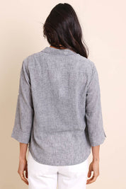 Model Amandam wearing size 10 of the The Easy Wear Shirt  - Graphite in colour Graphite, from the back