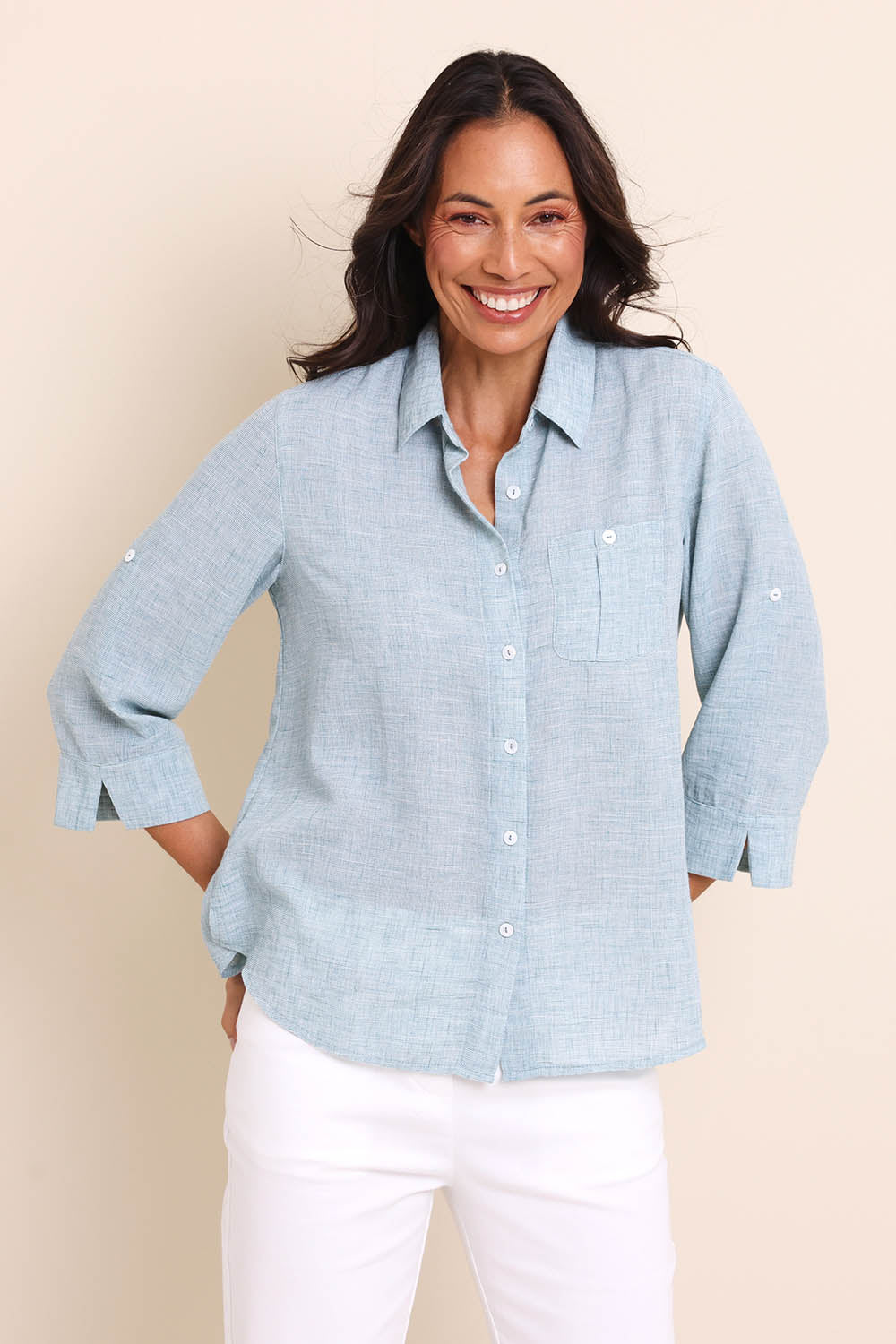 Model Amandam wearing size 10 of the The Easy Wear Shirt  - Mint in colour Mint, in a cropped view