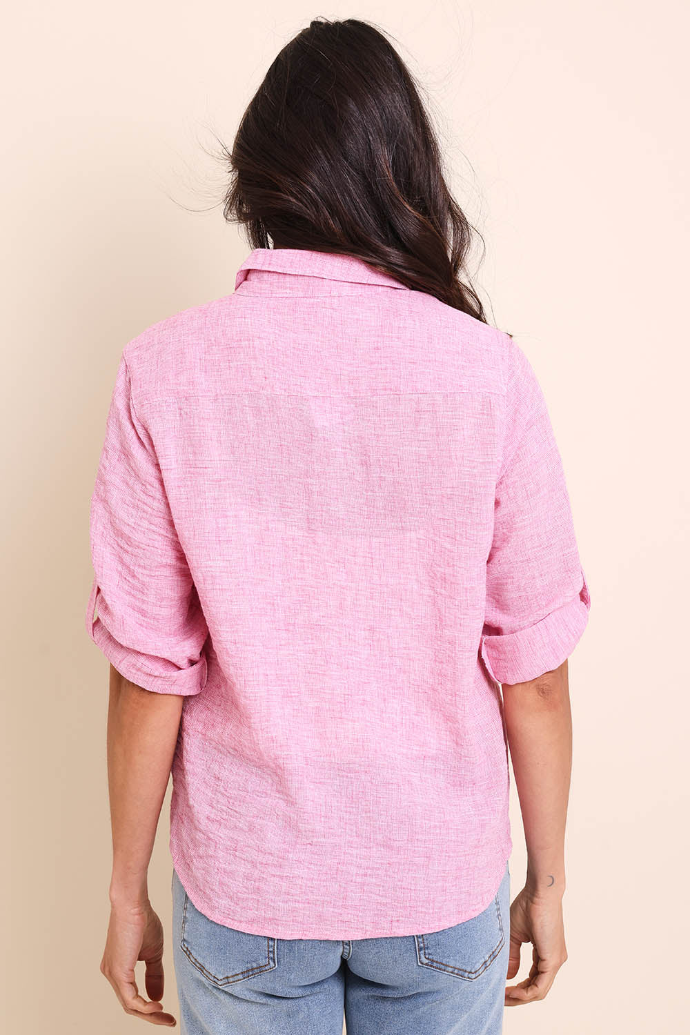 Model Amandam wearing size 10 of the The Easy Wear Shirt  - Rose in colour Rose, from the back
