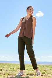Model Amanda wearing size 10 of The Teachers Cotton Pant With Pockets in colour Pinegrove (Green), from the front, showing the whole outfit