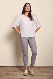 Model Amandam wearing size 10 of the The Cotton Pull On Stretch Comfort Pant – Latte in colour Latte, from the front