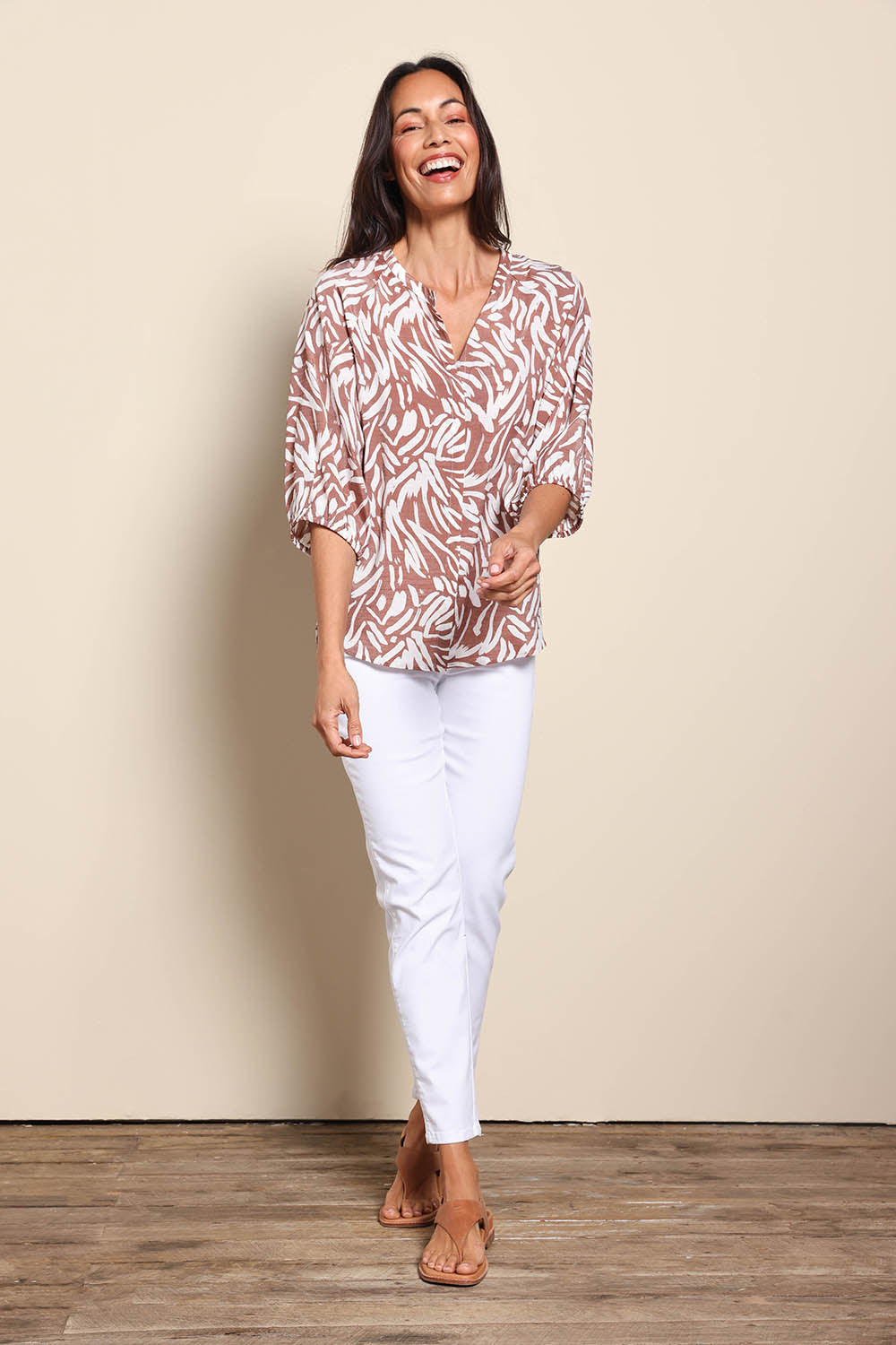 Model Amandam wearing size 10 of the The Cotton Pull On Stretch Comfort Pant – White in colour White, from the front