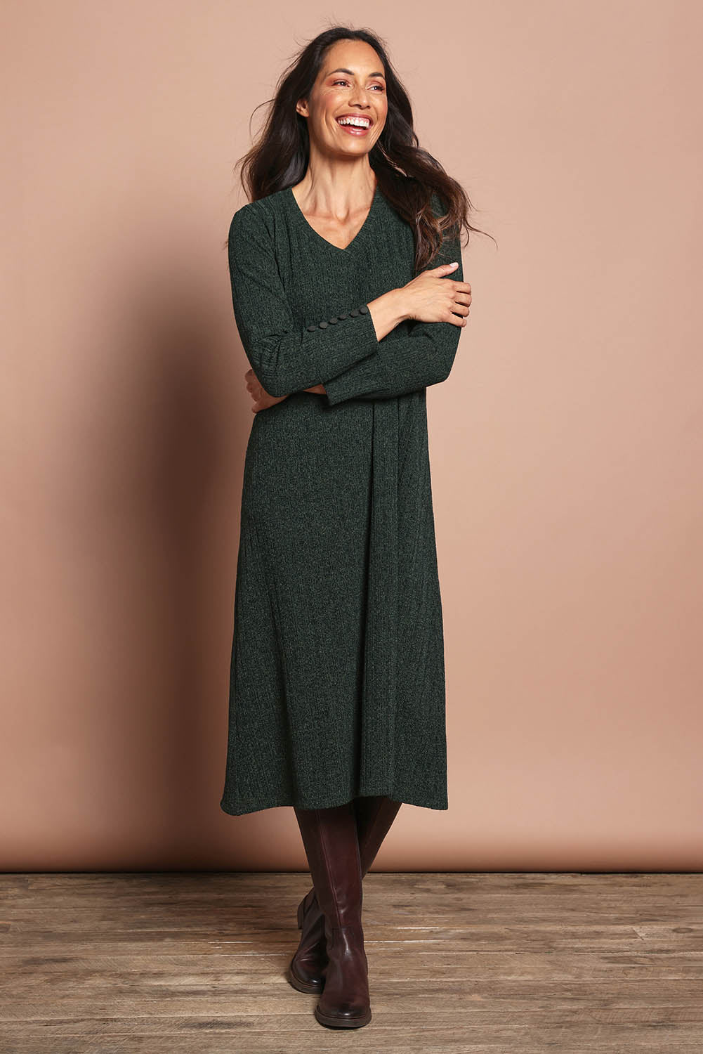 Model Amanda wearing size 10 of The Easy Wear Knit Dress in colour Khaki (Green), from the front, showing the whole outfit
