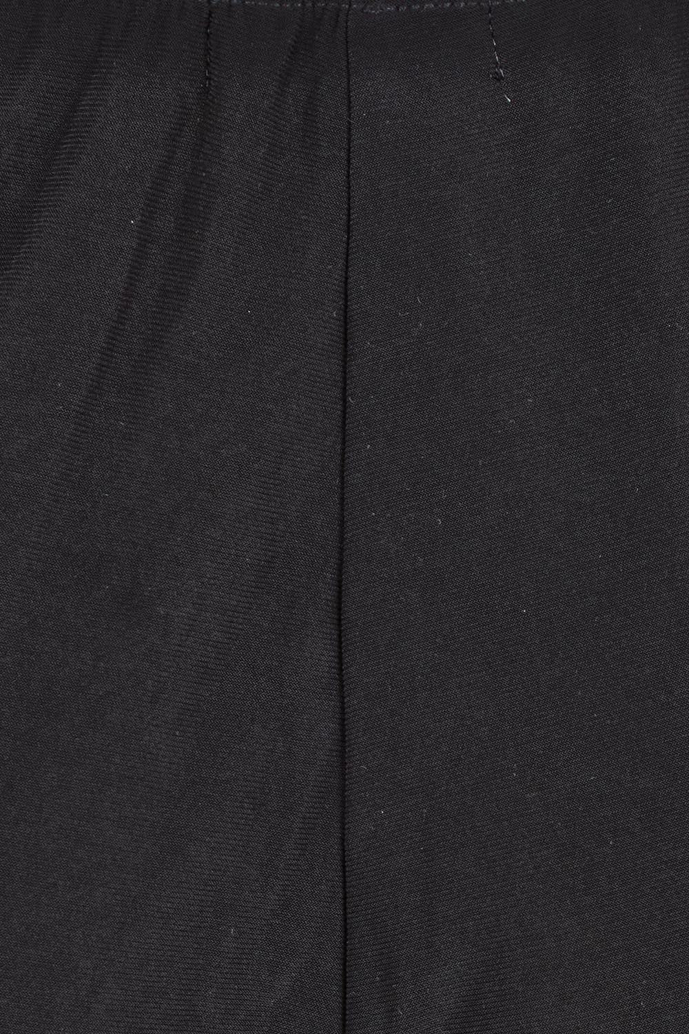 Product shot of The Travel Wide Leg Pant in colour Black (Black), detail