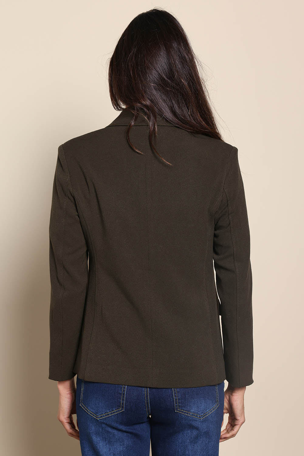 Model Amandam wearing size 10 of the The Classic Double Breasted Blazer – Olive in colour Olive, from the back