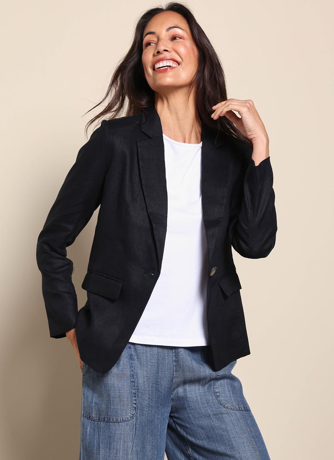 Model Amandam wearing size 10 of the The Classic Every Wear Blazer – Black in colour Black, from an angle