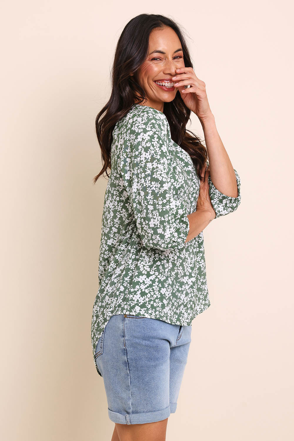 Model Amandam wearing size 10 of the The Every Wear Shirt  - Greenwhite in colour Greenwhite, from an angle